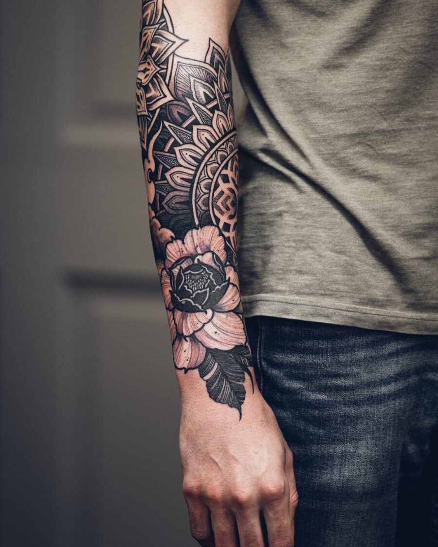 Elegant floral half sleeve tattoo design
