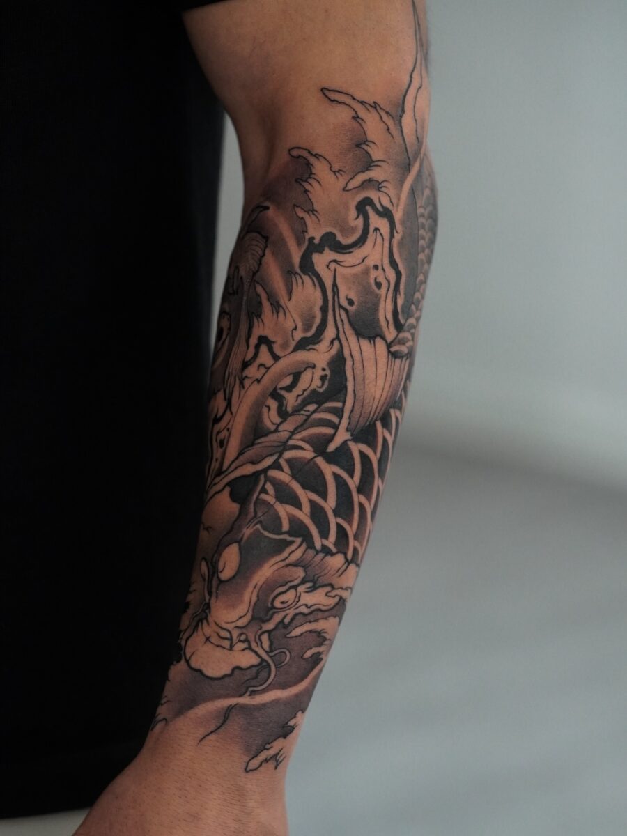 Intricate Koi and Dragon Half Sleeve Tattoo