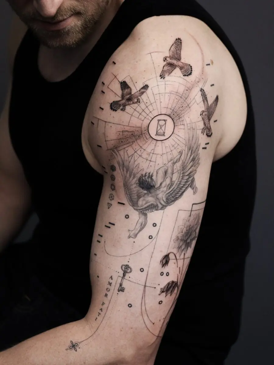 Elegant half sleeve tattoo with intricate designs
