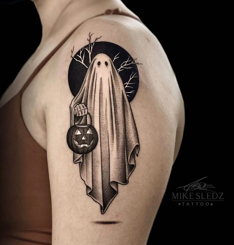 Charming ghost-themed tattoo for Halloween vibes