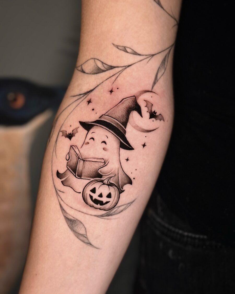 Charming ghost with a witch hat tattoo