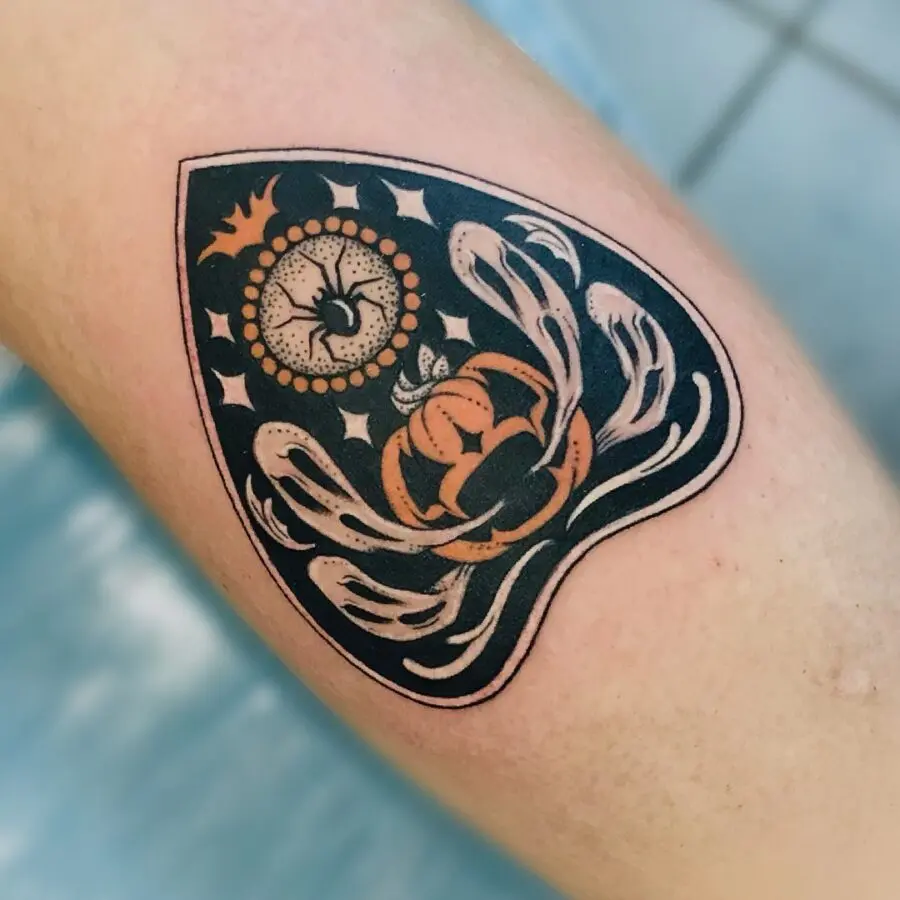 Spooky Ouija Board-Inspired Pumpkin Tattoo
