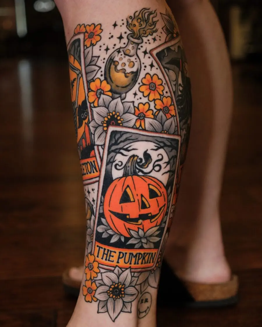 Unique pumpkin tattoo surrounded by flowers