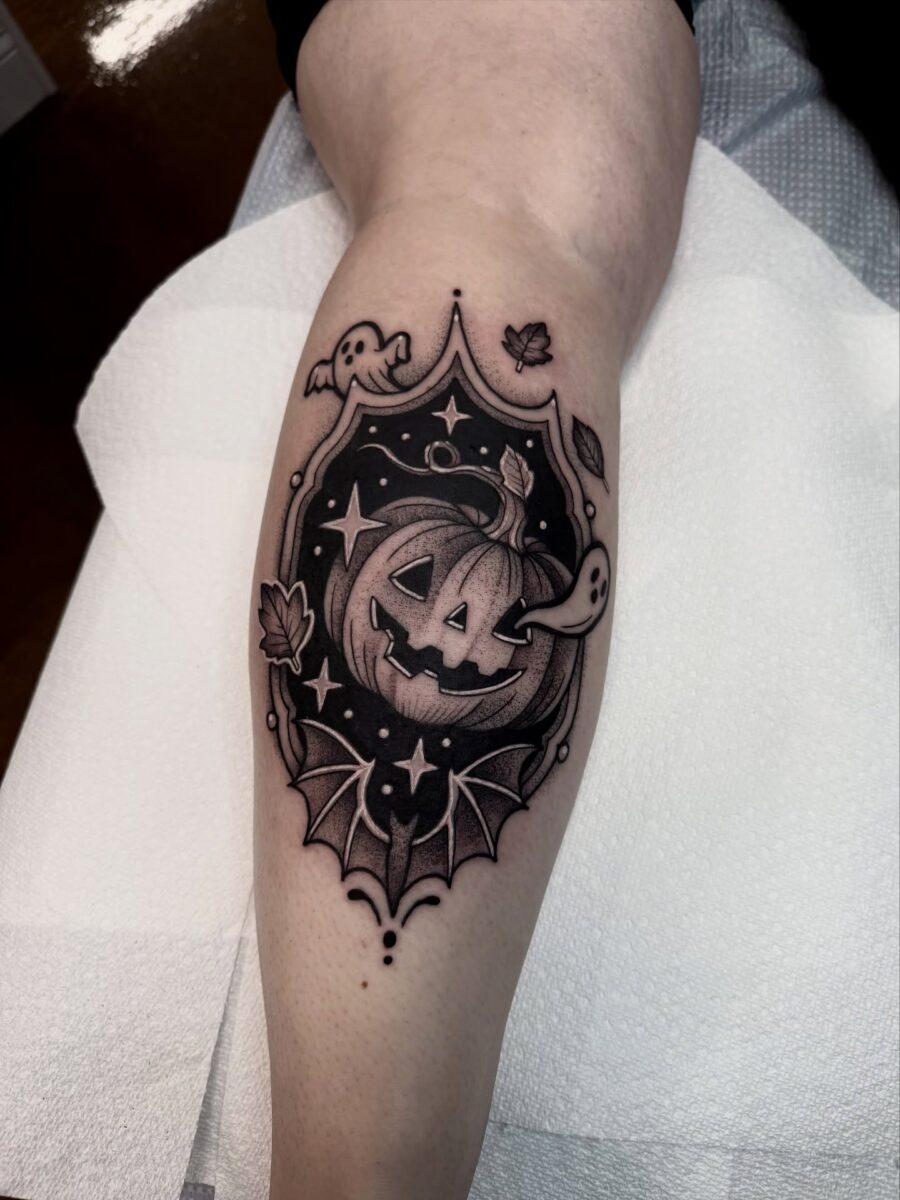 Charming pumpkin and ghost tattoo design