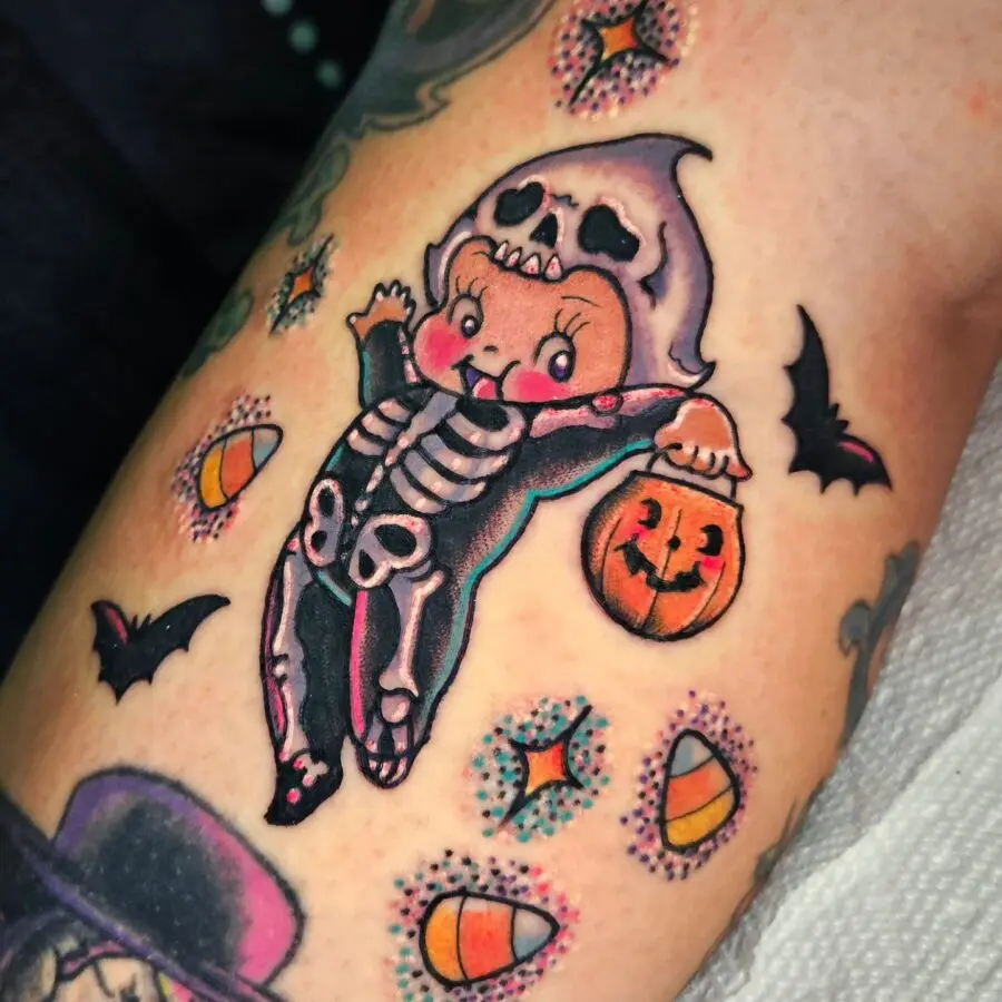 Whimsical skeleton child tattoo for Halloween fun