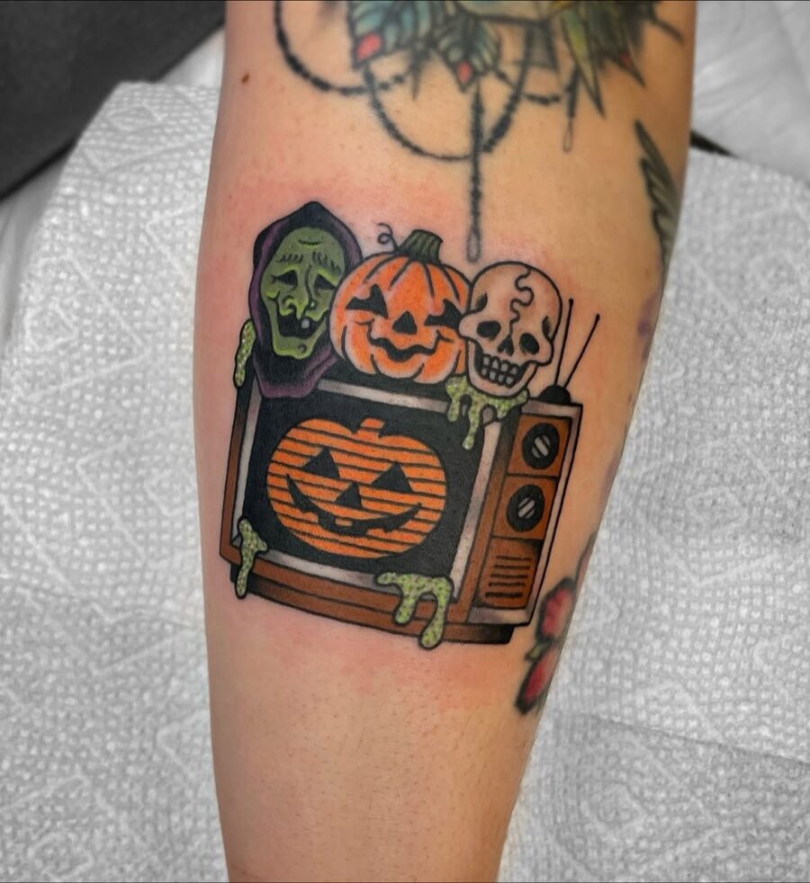 Quirky Halloween-themed tattoo showcasing spooky vibes