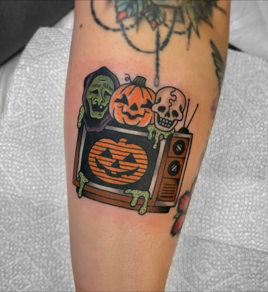 Quirky Halloween-themed tattoo showcasing spooky vibes