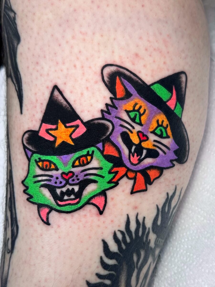 Spooky Cat Tattoos for Halloween Vibes