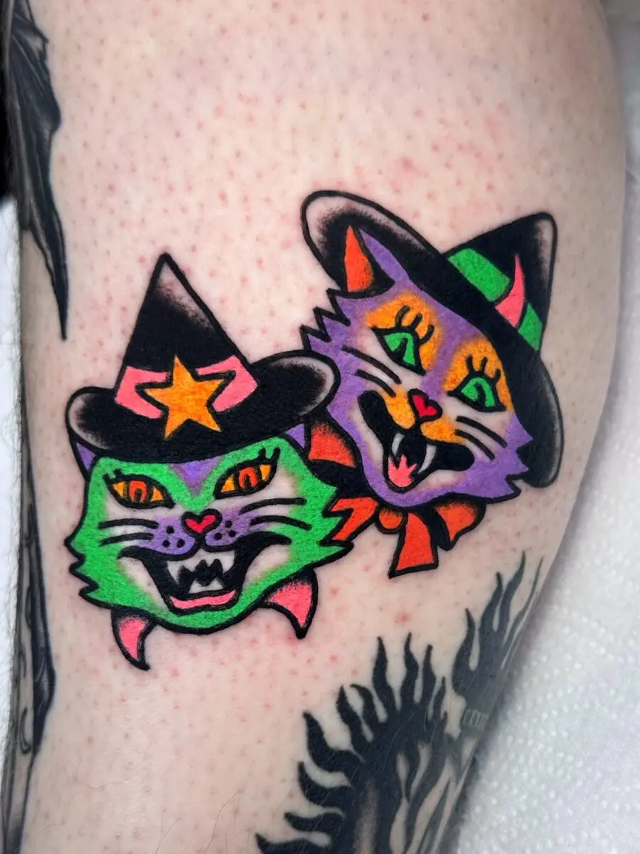 Spooky Cat Tattoos for Halloween Vibes