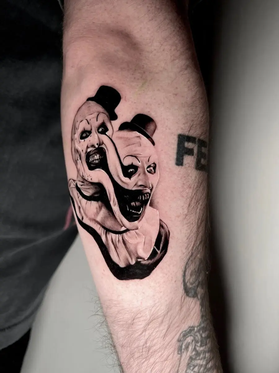 Dual-faced clown tattoo for eerie vibes