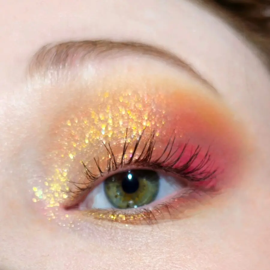 Vibrant sunset-inspired halo eye makeup look