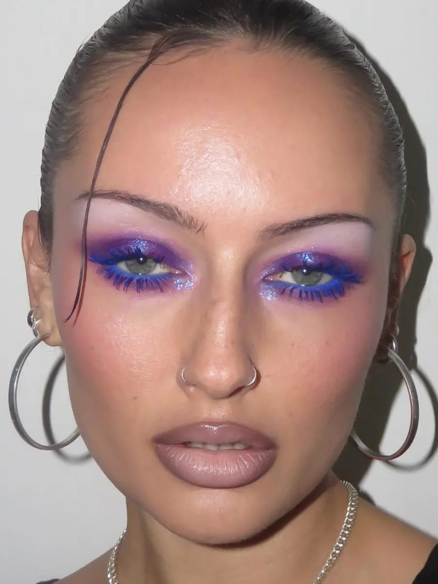 Bold halo eyes with vibrant blue accents