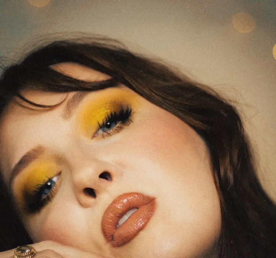 Vibrant yellow halo eye makeup look
