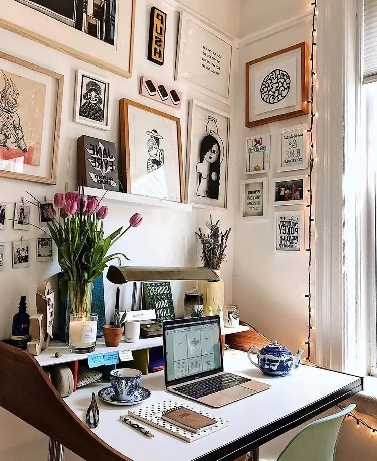Chic workspace with artistic touches and flowers