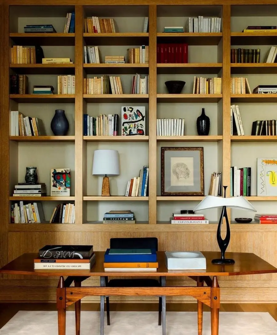 Stylish home office with organized bookshelves