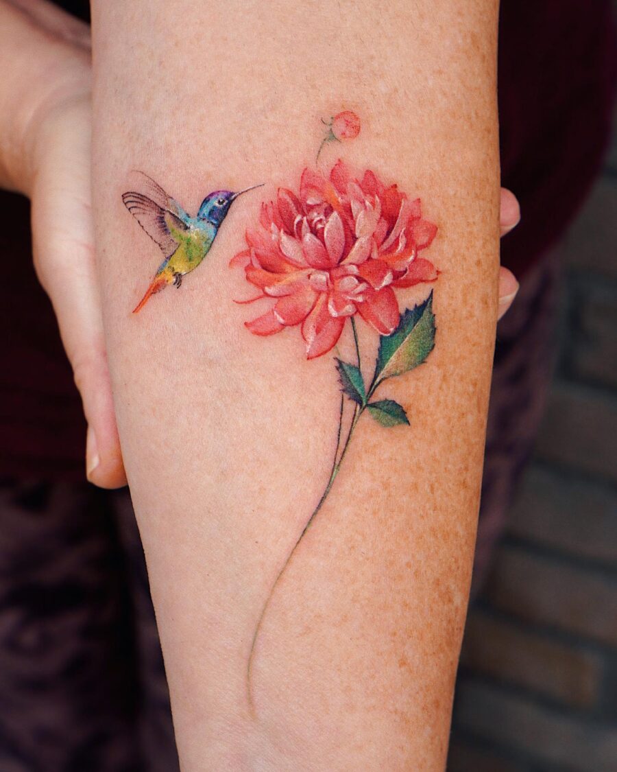 Beautiful dahlia tattoo with hummingbird detail