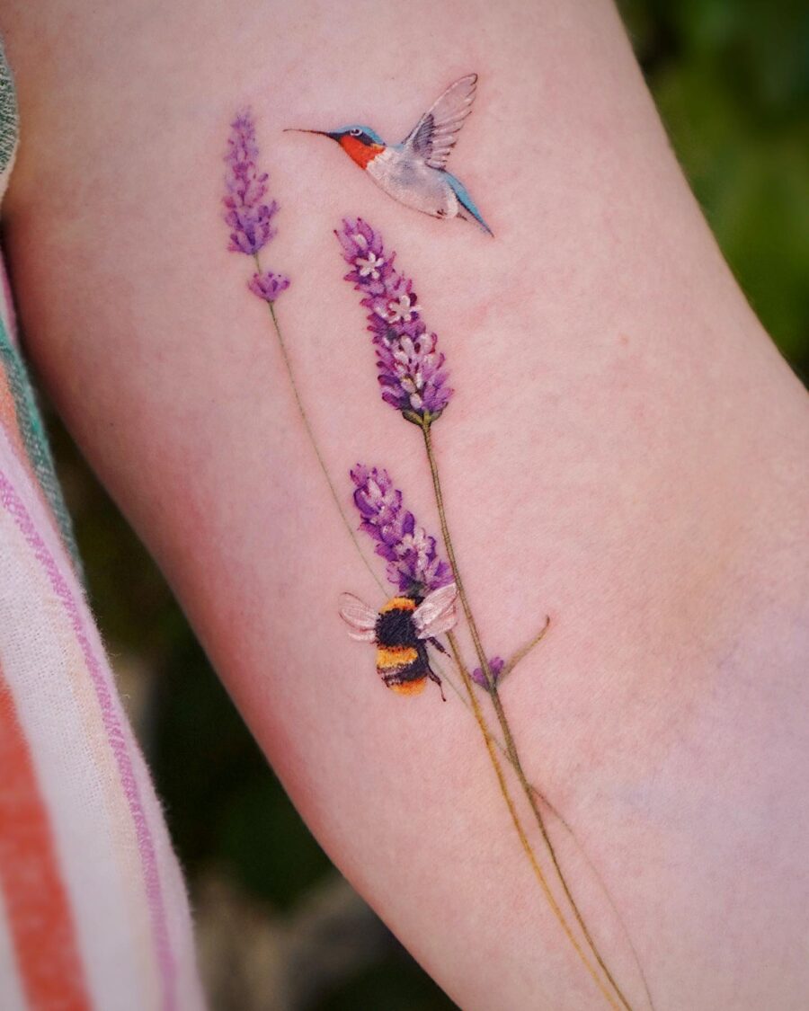 Delicate lavender tattoo with hummingbird and bee