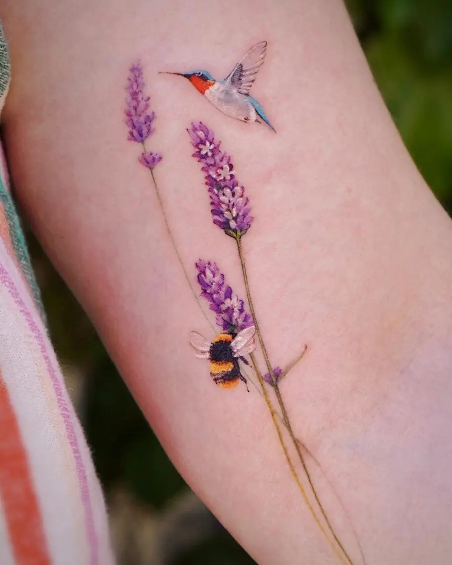 Delicate lavender tattoo with hummingbird and bee