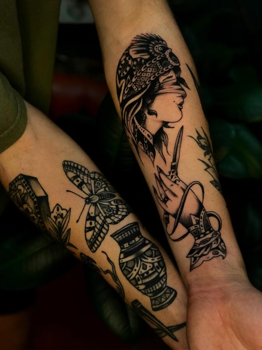 Intricate half sleeve tattoo with feminine vibes