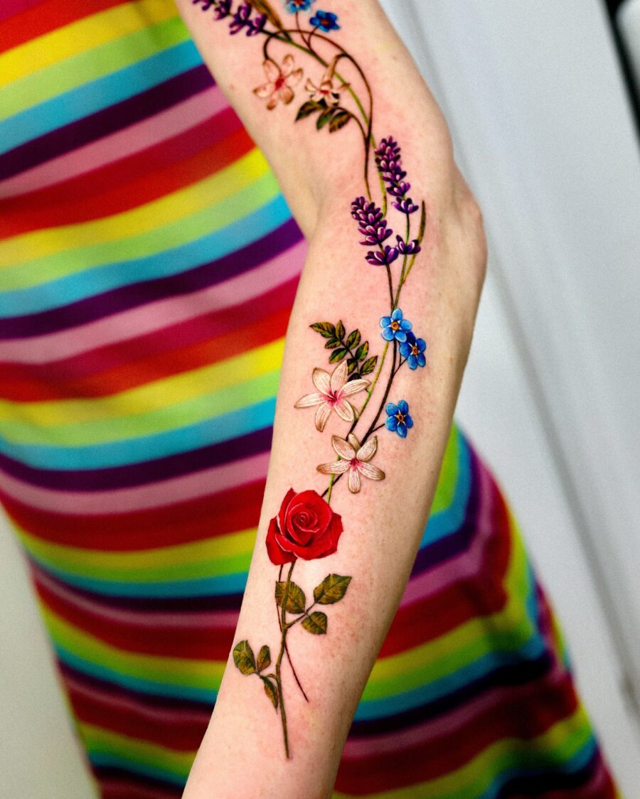 Vibrant lavender flowers intertwined with rose tattoo