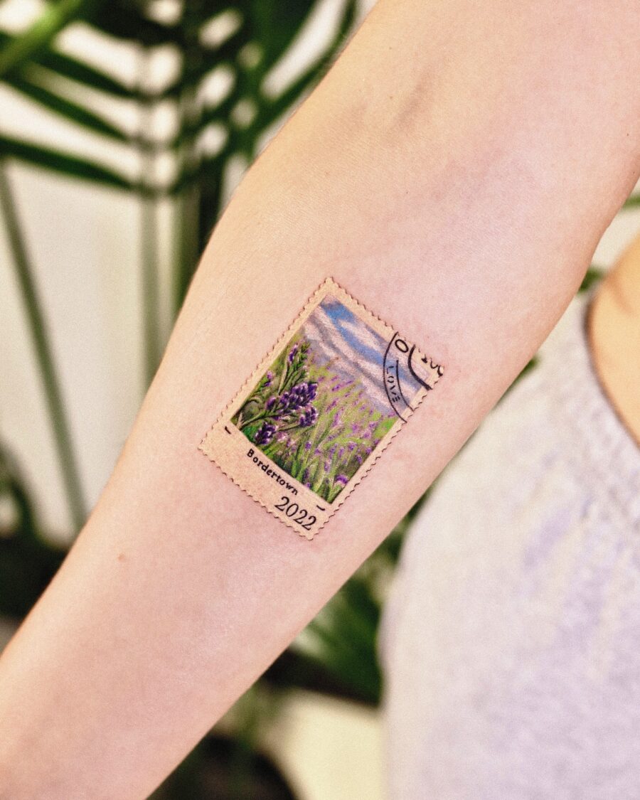 Charming lavender postage stamp tattoo design