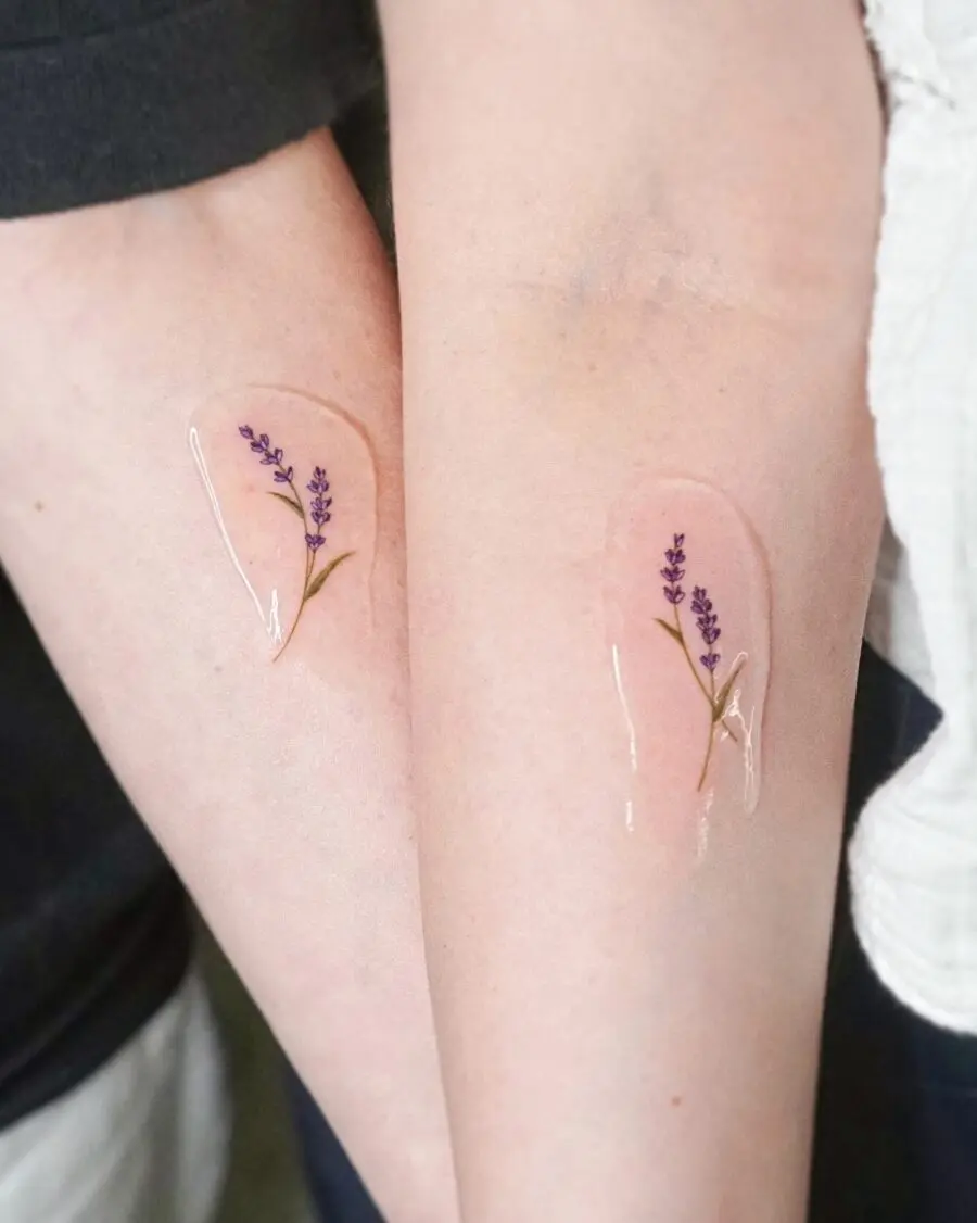 Elegant lavender tattoos on bare skin