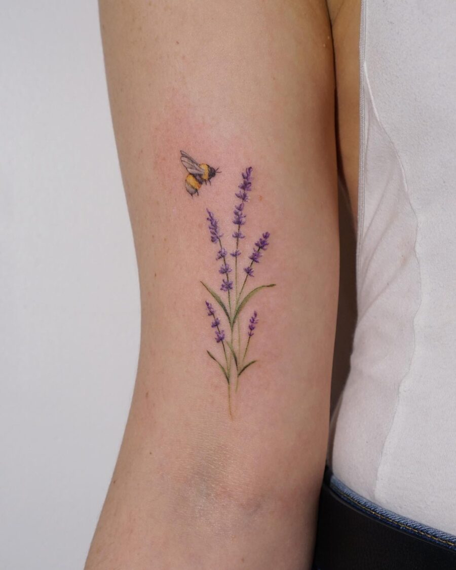 Delicate lavender and bee tattoo design