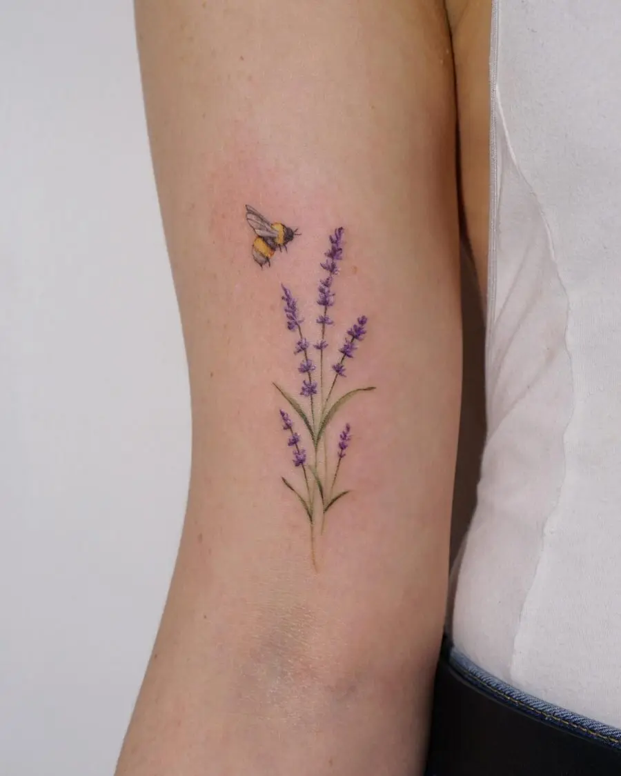 Delicate lavender and bee tattoo design