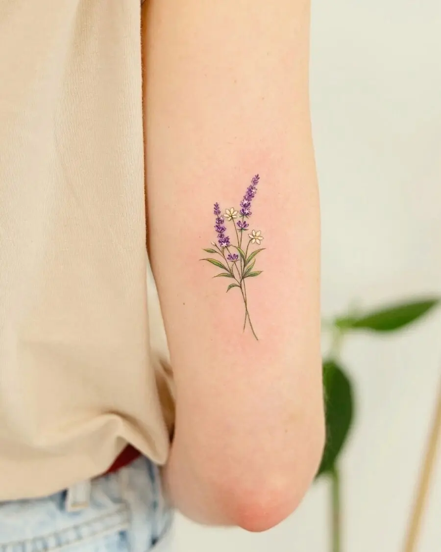 Elegant lavender flower tattoo on the arm