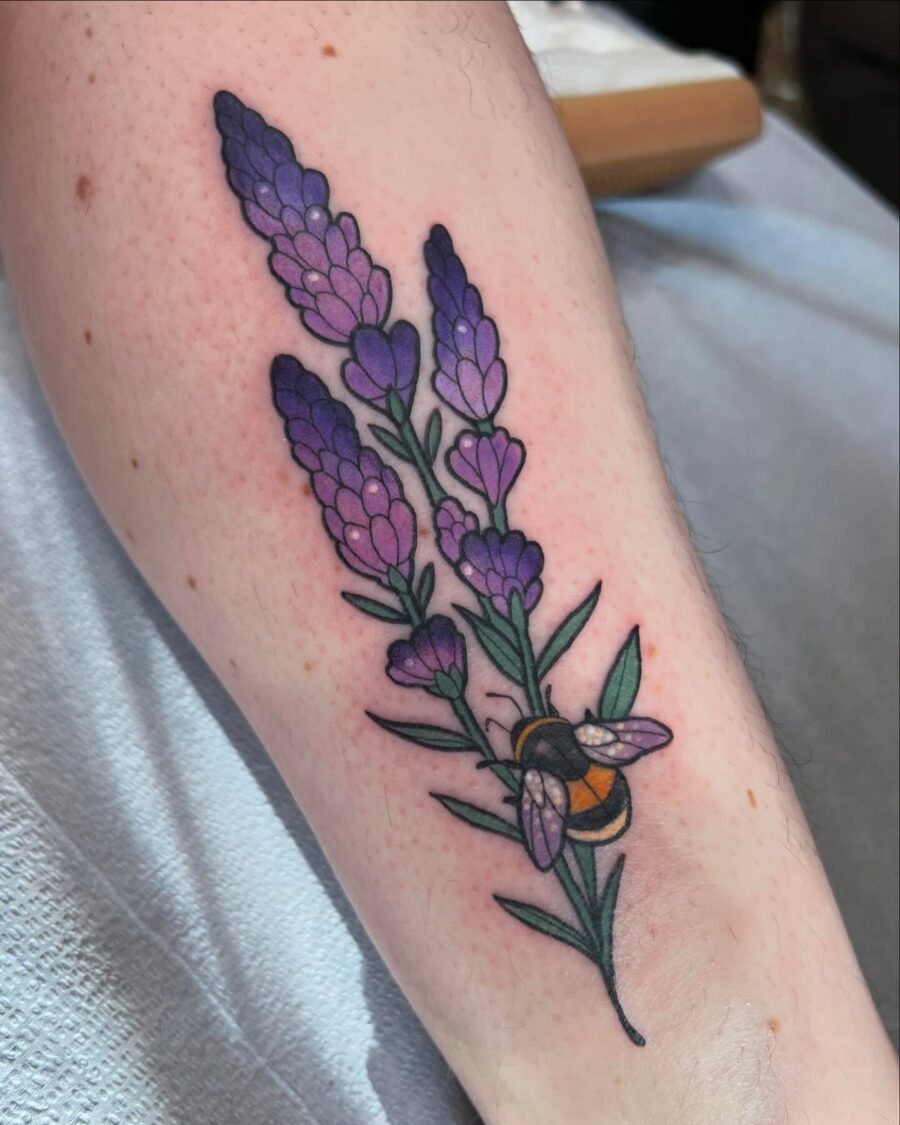 Elegant lavender tattoo with a buzzing bee
