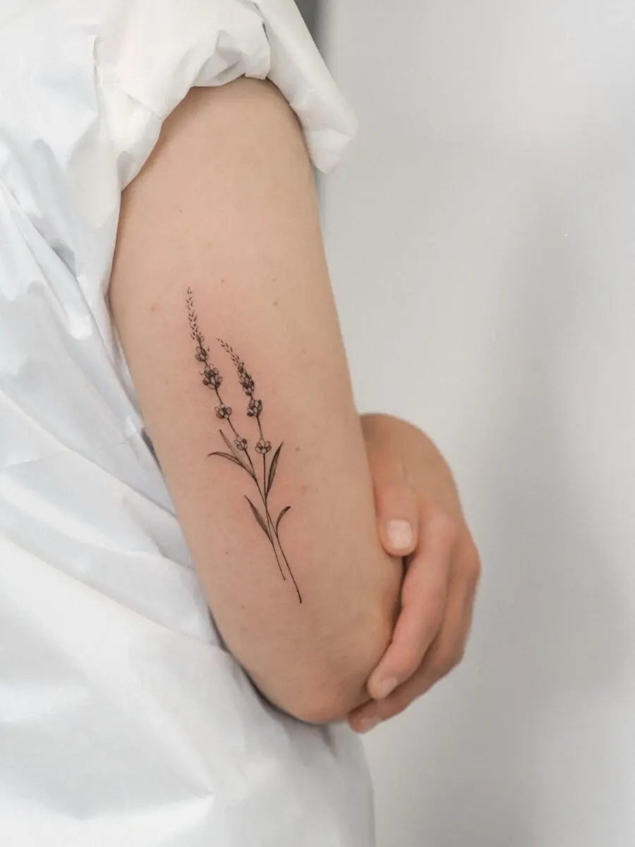 Elegant Minimalist Lavender Arm Tattoo Design