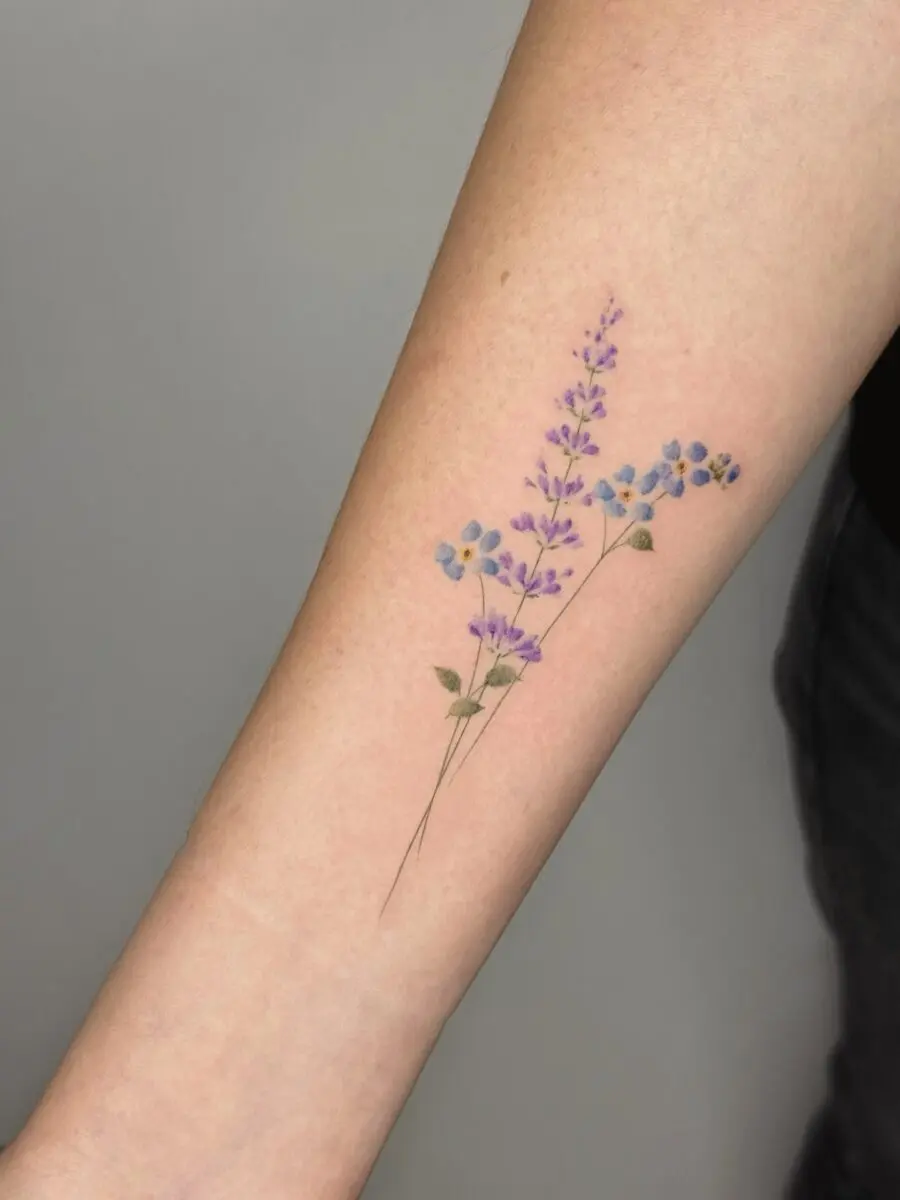 Elegant lavender tattoo on forearm