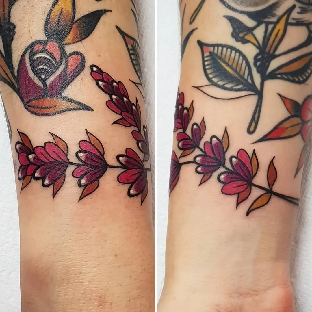 Elegant lavender tattoo design on forearms