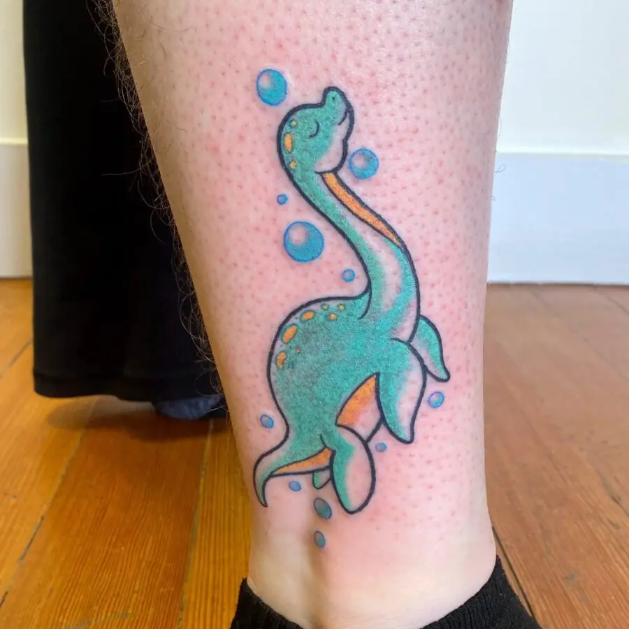 Vibrant Loch Ness Monster Tattoo for Adventure Seekers