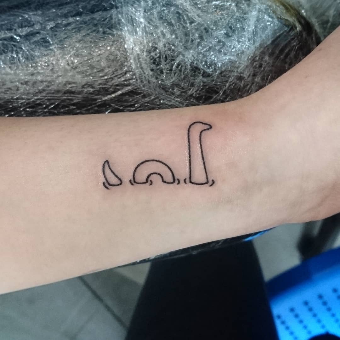 Minimalist Loch Ness Monster Tattoo Design