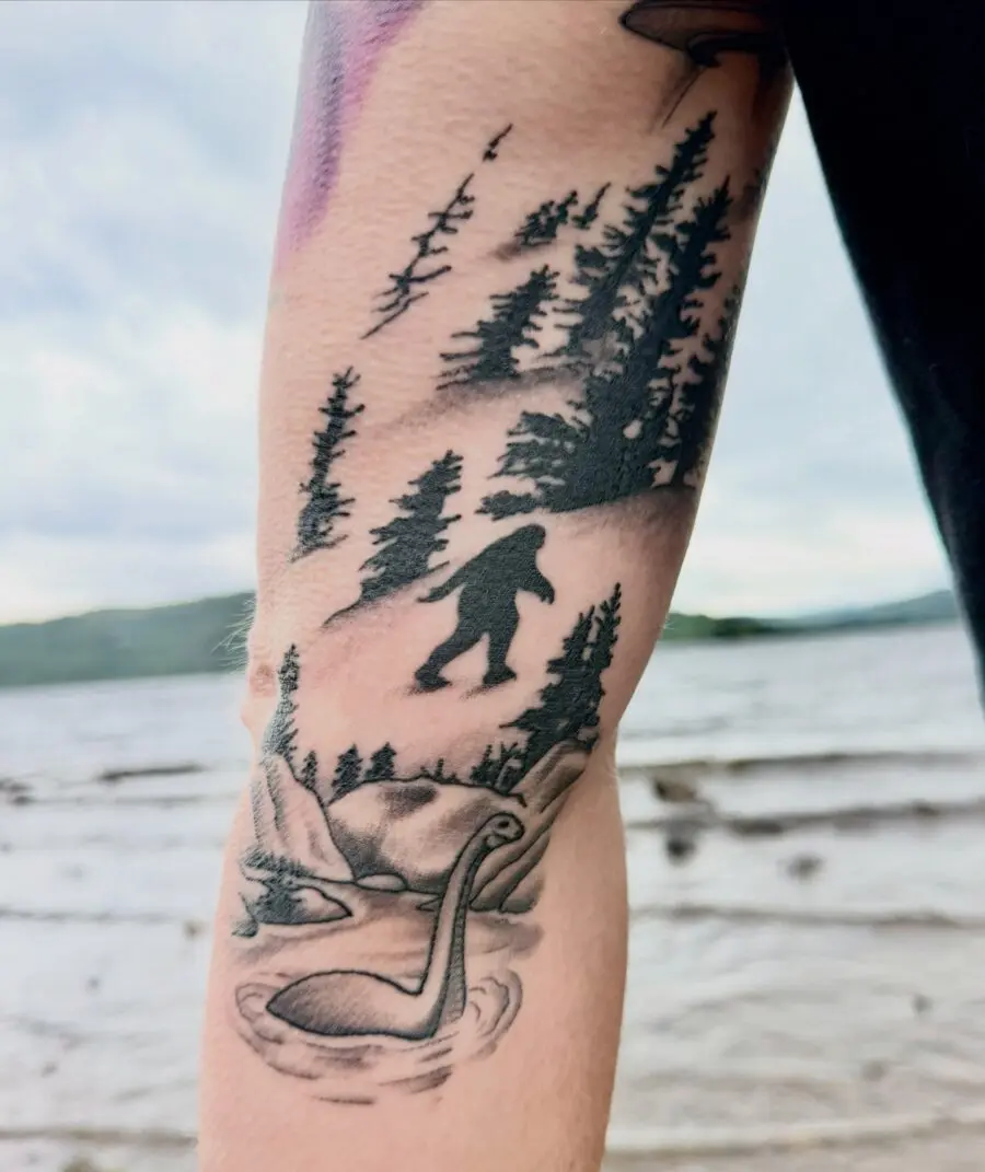 Intricate Loch Ness Monster Tattoo with Forest Scene