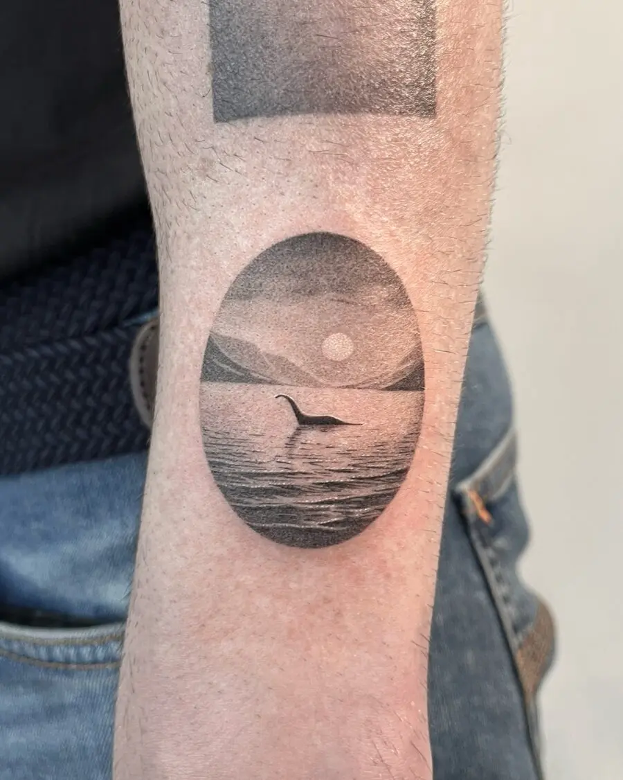 Elegant loch ness monster tattoo in serene setting