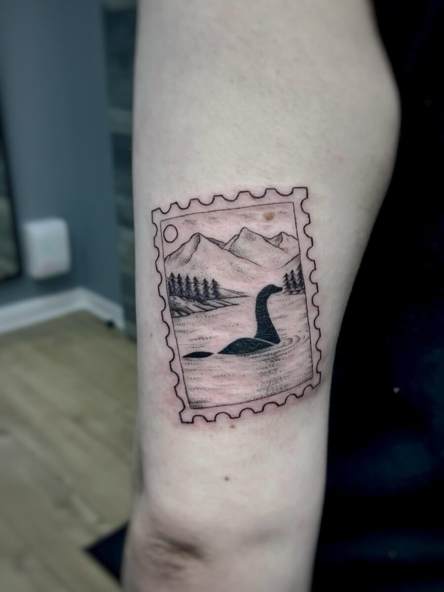 Unique Loch Ness Tattoo in a Stamp Design