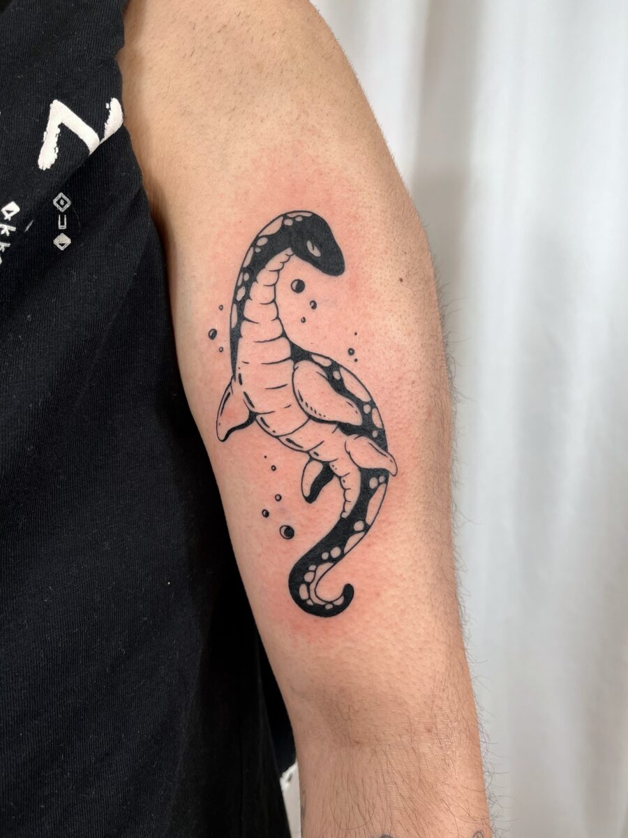 Charming Loch Ness Monster Tattoo Design