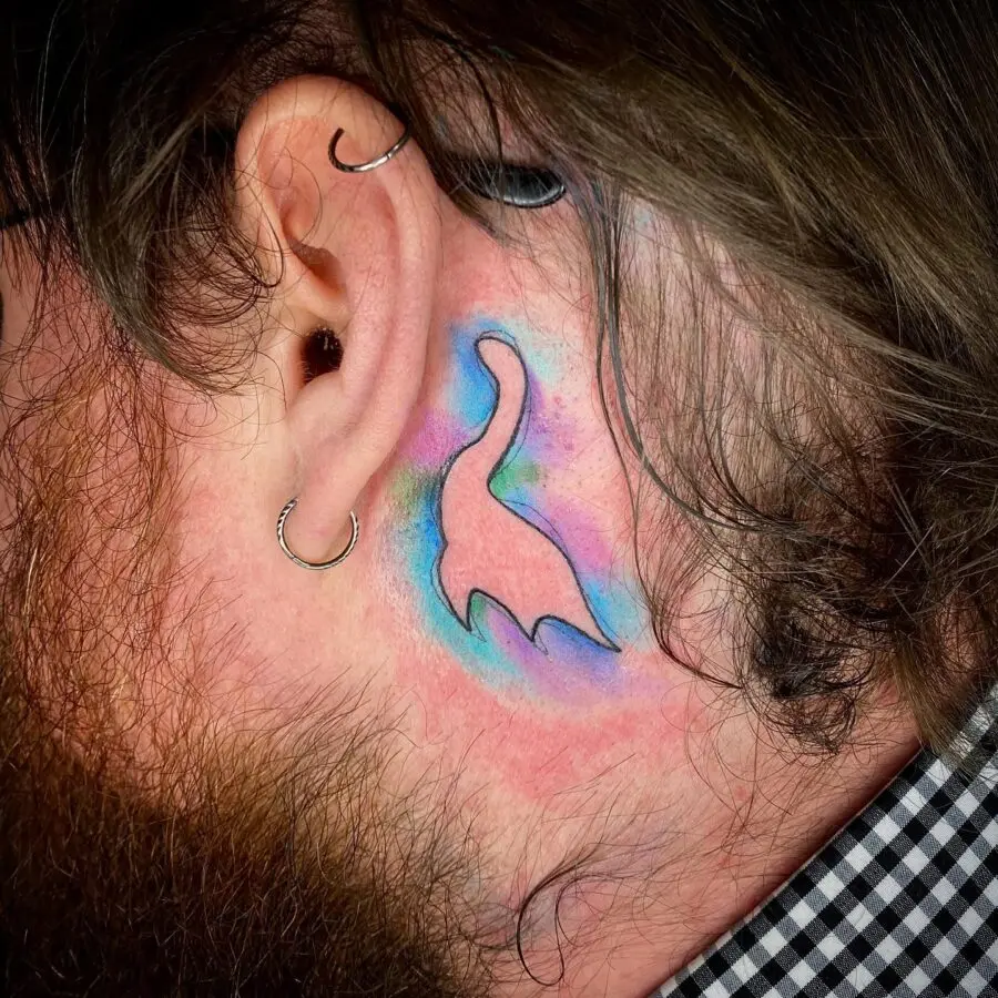 Colorful Loch Ness Monster Ear Tattoo