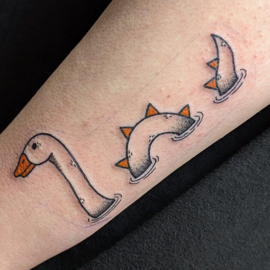 Playful Loch Ness Monster Tattoo Design