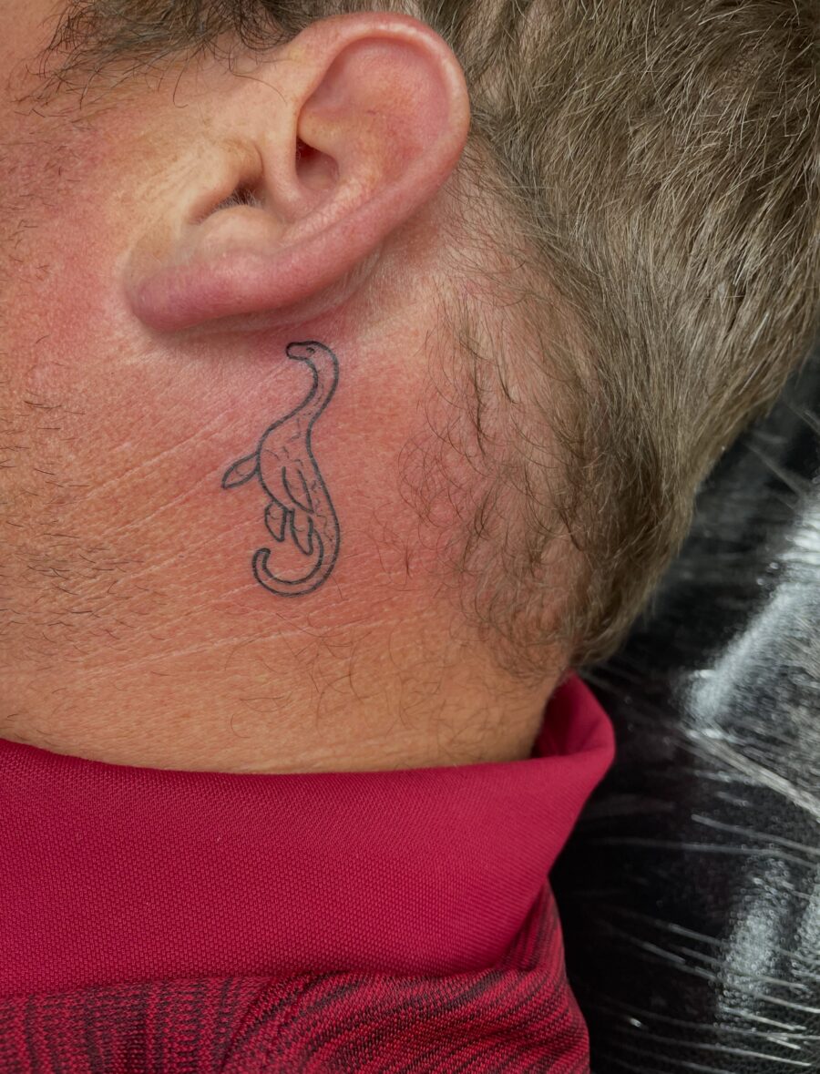 Unique Loch Ness Tattoo on Side of Neck