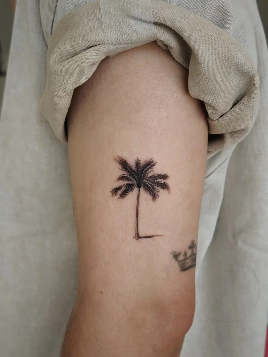 Elegant palm tree tattoo for nature lovers