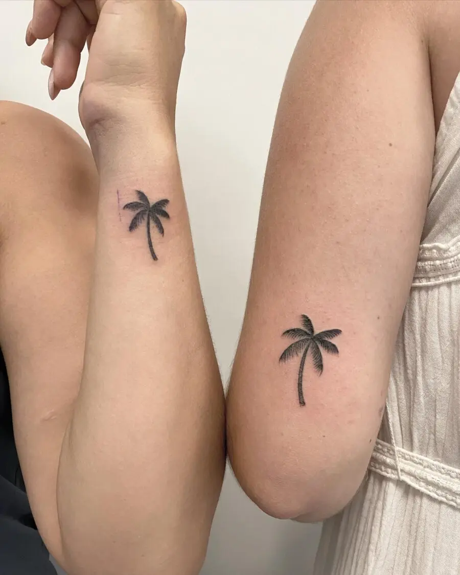 Elegant palm tree tattoos for a tropical vibe.