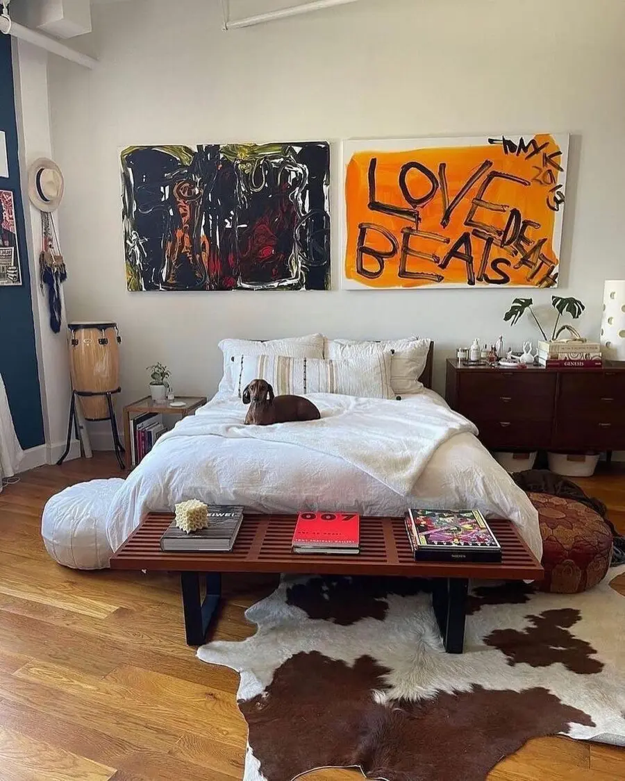 Cozy modern boho bedroom with vibrant art