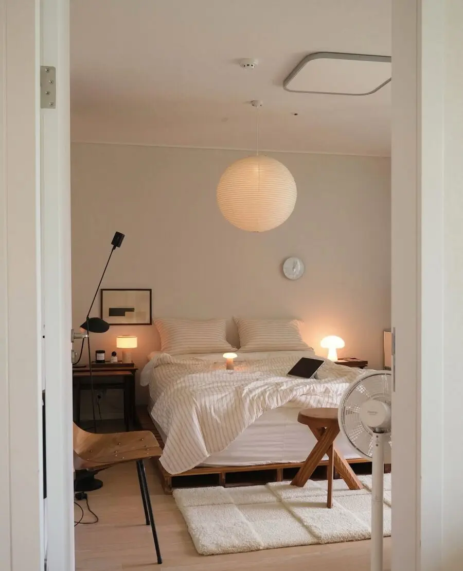 Serene modern bedroom with soft lighting touches