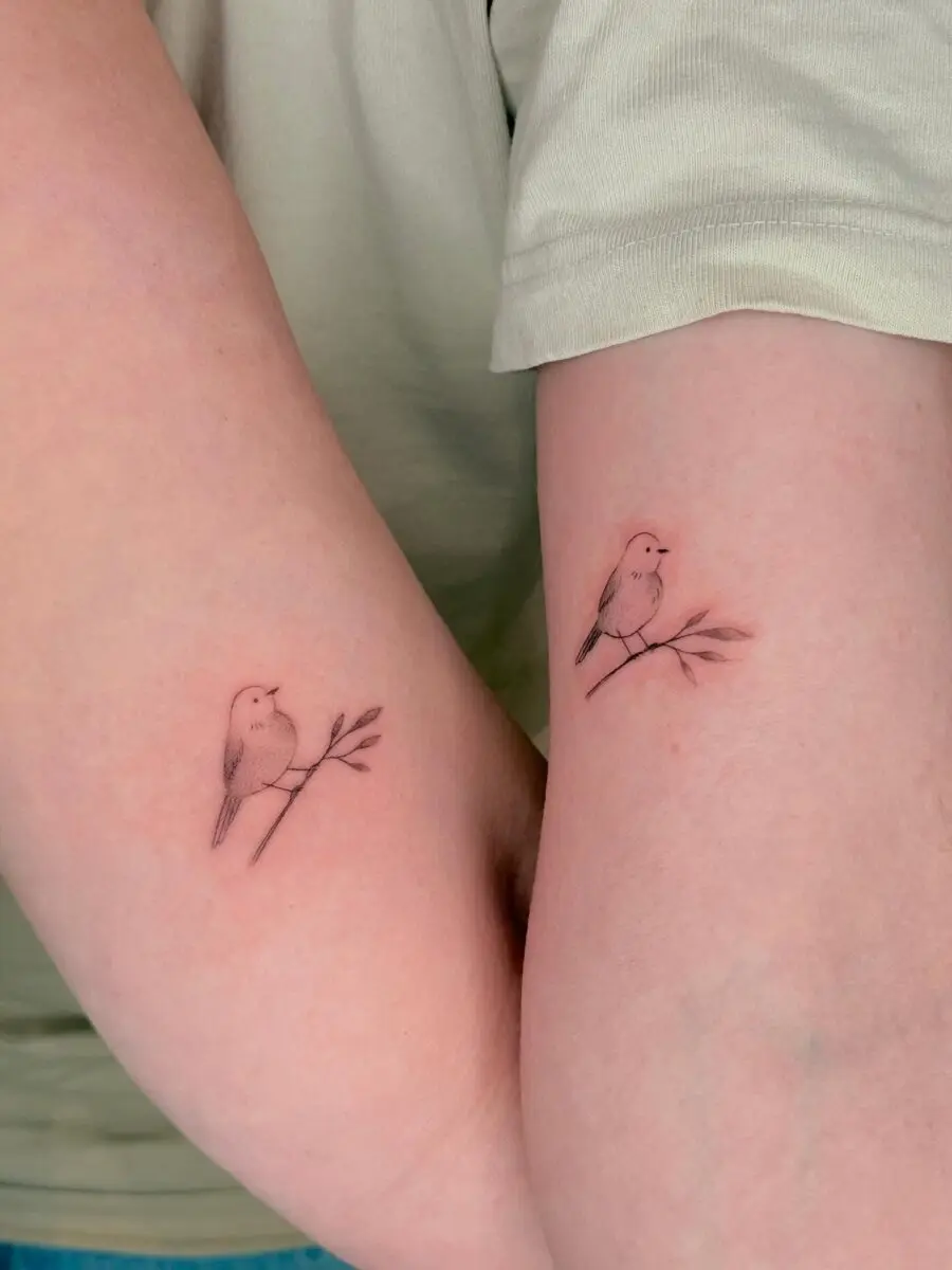 Bird tattoos symbolizing mother-son bond