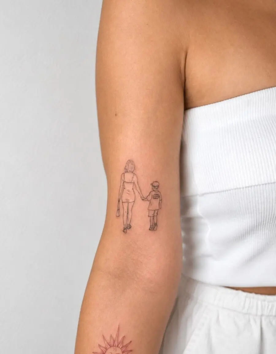 Heartwarming Mother-Son Tattoo Design