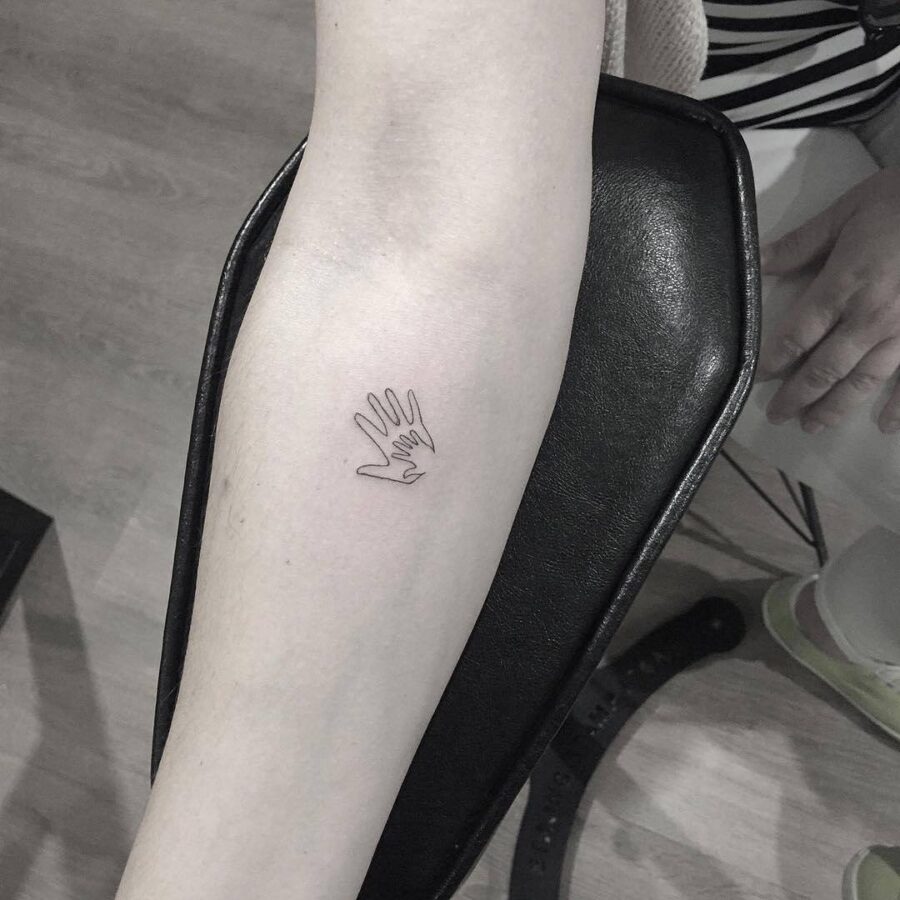 Minimalist Mother-Son Hand Tattoo Design