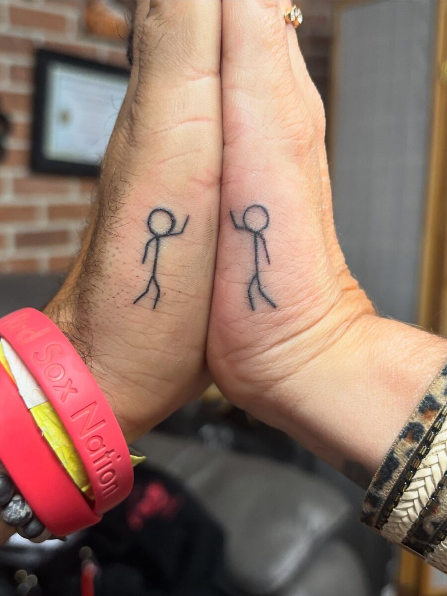 Simple yet meaningful mother-son tattoo connection